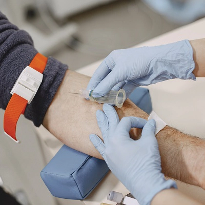 blood test with healthcare worker